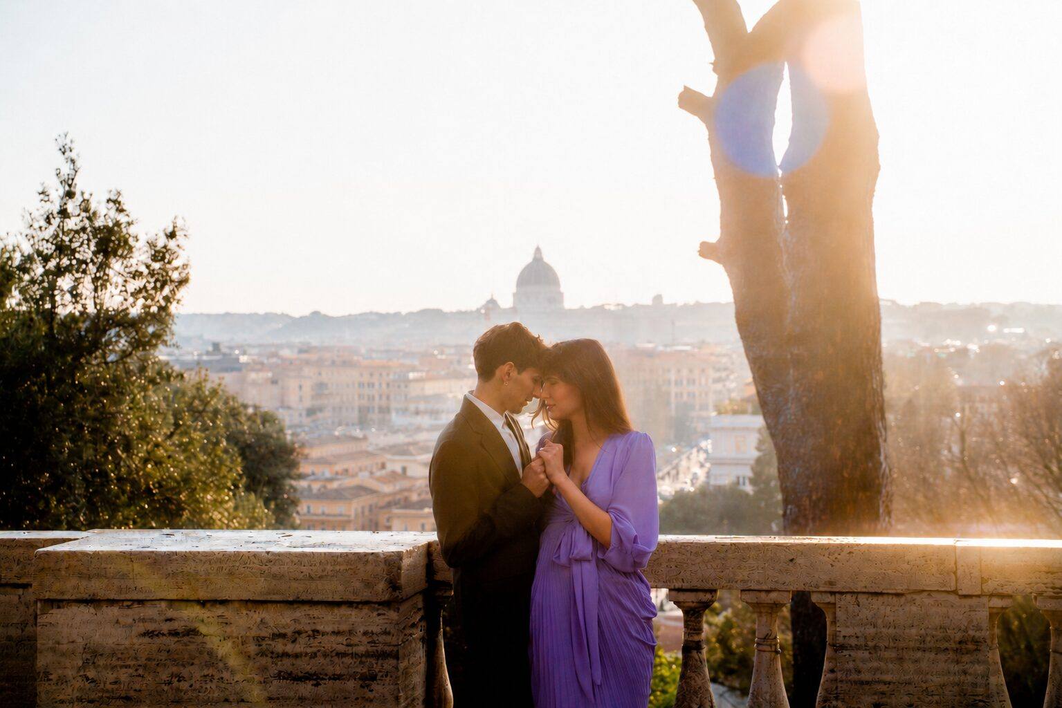 Couple embracing at sunset on an Italian terrace